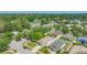 Neighborhood aerial view showcasing nearby green space and suburban landscape at 8502 N Hyaleah Rd, Tampa, FL 33617