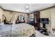A bedroom featuring a bed, and natural light to give an airy feel at 8502 N Hyaleah Rd, Tampa, FL 33617