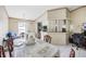 Open dining space showing the kitchen area and bar seating, enhancing the home's functionality at 8502 N Hyaleah Rd, Tampa, FL 33617