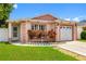 Charming single-story home with a one-car garage and colorful landscaping at 8502 N Hyaleah Rd, Tampa, FL 33617