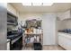 Functional kitchen with stainless steel appliances and ample storage space at 8502 N Hyaleah Rd, Tampa, FL 33617