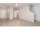 Bright and airy living space with tile flooring and access to the upper levels at 9741 Mulberry Marsh Ln, Sun City Center, FL 33573