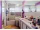 Bathroom featuring a shower with glass doors and a single sink at 11109 Sumner Rd, Wimauma, FL 33598