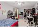 Bedroom featuring storage, closet, and room with a desk space, ideal for students at 11109 Sumner Rd, Wimauma, FL 33598