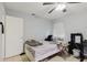Well-lit bedroom featuring a ceiling fan and neutral walls and flooring at 11109 Sumner Rd, Wimauma, FL 33598