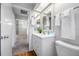 Bathroom boasts sleek vanity, a toilet, and wood-look flooring at 1111 Chatham Ct, Safety Harbor, FL 34695
