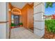 Home entrance highlighting the tiled floor, and the decorative potted plants at 1111 Chatham Ct, Safety Harbor, FL 34695