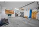 Garage offers ample storage and workspace for projects and organization at 1111 Chatham Ct, Safety Harbor, FL 34695