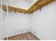 Walk-in closet featuring carpet, shelving, and built-in storage at 1111 Chatham Ct, Safety Harbor, FL 34695