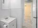 Bright and airy bathroom featuring a vanity and a tiled floor leading to an adjacent room at 11416 126Th N Ave, Largo, FL 33778