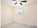 Neutral bedroom with tile flooring and window at 11416 126Th N Ave, Largo, FL 33778