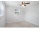 Neutral bedroom with tile flooring and window at 11416 126Th N Ave, Largo, FL 33778