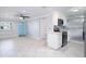 Open floor plan featuring the living room and kitchen, great for entertaining at 11416 126Th N Ave, Largo, FL 33778