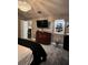 Sophisticated bedroom featuring dark wood accents, chandelier lighting, and stylish decor at 11760 Ashley Ct, Seminole, FL 33772