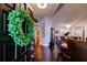 Elegant foyer showcasing hardwood floors, stylish decor, and a welcoming atmosphere at 11760 Ashley Ct, Seminole, FL 33772