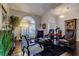 Bright living room showcasing hardwood floors, arched windows, and stylish furnishings at 11760 Ashley Ct, Seminole, FL 33772