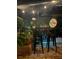 Stylish outdoor bar area featuring a grill, bar stools, and decorative accents at 11760 Ashley Ct, Seminole, FL 33772