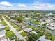Charming waterfront homes nestled in a picturesque canal community with lush landscaping and boat docks at 13316 Carol Dr, Hudson, FL 34667