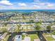 Expansive aerial view of a waterfront community with canals, homes, and access to the ocean, a tranquil Florida setting at 13316 Carol Dr, Hudson, FL 34667