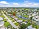 Waterfront home with private dock, nestled in a peaceful canal community, indicated by a prominent arrow at 13316 Carol Dr, Hudson, FL 34667