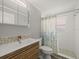 Modern bathroom features a stylish vanity and updated shower with decorative tile work at 13316 Carol Dr, Hudson, FL 34667