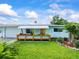 Lovely single-story home with welcoming curb appeal, charming front porch with planter boxes at 13316 Carol Dr, Hudson, FL 34667