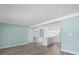 Bright living room featuring new floors, neutral paint, and modern fixtures at 13316 Carol Dr, Hudson, FL 34667