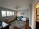 Inviting bedroom offers natural light from large windows, wood floors and a cozy atmosphere at 1365 Snell Isle Ne Blvd # 6E, St Petersburg, FL 33704