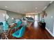 Spacious living room with hardwood floors, recessed lighting, and an open view to the kitchen and bar seating at 1365 Snell Isle Ne Blvd # 6E, St Petersburg, FL 33704