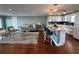 Inviting living room boasts hardwood floors, recessed lights, and is open to the updated kitchen and bar seating at 1365 Snell Isle Ne Blvd # 6E, St Petersburg, FL 33704