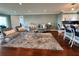 Inviting living room with hardwood floors, neutral furniture, and plenty of natural light at 1365 Snell Isle Ne Blvd # 6E, St Petersburg, FL 33704