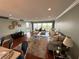 Spacious living room with hardwood floors, comfortable seating, and open layout at 1365 Snell Isle Ne Blvd # 6E, St Petersburg, FL 33704