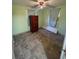 Simple bedroom with a hardwood-style floor, wardrobe and window at 14935 Ogden Loop, Odessa, FL 33556