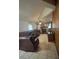 The living room offers tiled flooring and a fireplace at 14935 Ogden Loop, Odessa, FL 33556