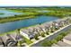 Stunning aerial view of a residential area with homes lining the waterfront at 1604 Acadia Harbor Pl, Brandon, FL 33511