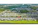 Charming homes in a scenic community with waterfront views and manicured lawns at 1604 Acadia Harbor Pl, Brandon, FL 33511