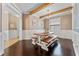 Cozy dining room featuring a farmhouse-style table with wood benches and stylish decor at 1604 Acadia Harbor Pl, Brandon, FL 33511