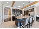 Open kitchen with granite countertops, stainless steel appliances, and a large kitchen island at 1604 Acadia Harbor Pl, Brandon, FL 33511