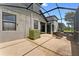 The covered and screened-in patio is perfect for relaxing outdoors while still being protected from the elements at 1604 Acadia Harbor Pl, Brandon, FL 33511