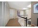 Bright hallway features multiple closets and skylights leading to the second floor at 1681 Long Bow Ln, Clearwater, FL 33764