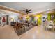 Bright and airy living area with contemporary furnishings and a cozy dining nook at 1681 Long Bow Ln, Clearwater, FL 33764