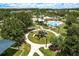 Community playground, pool and recreation area with mature landscaping at 19309 Prairie Tree Pl, Tampa, FL 33647