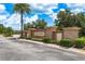 Elegant stone entrance to Heron Preserve community, surrounded by manicured landscaping at 19309 Prairie Tree Pl, Tampa, FL 33647