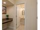 Clean and bright powder room with a pedestal sink and granite counter, perfect for guests at 19309 Prairie Tree Pl, Tampa, FL 33647