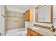 Bathroom with granite vanity and tub shower combo at 2202 Hickory Ridge Dr, Valrico, FL 33596