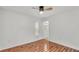 This bedroom offers laminate wood floors and a window with natural light at 2202 Hickory Ridge Dr, Valrico, FL 33596