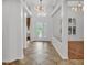 Bright foyer with tile flooring, decorative lighting, and open layout with views of the home at 2202 Hickory Ridge Dr, Valrico, FL 33596