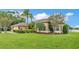 Beautiful front yard with lush green grass and easy to maintain landscaping at 2202 Hickory Ridge Dr, Valrico, FL 33596