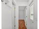Hallway featuring laminate wood floors and a coat rack; a practical and inviting space at 2202 Hickory Ridge Dr, Valrico, FL 33596