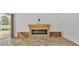 Living room features a modern fireplace with tile flooring and access to a screened patio at 2202 Hickory Ridge Dr, Valrico, FL 33596